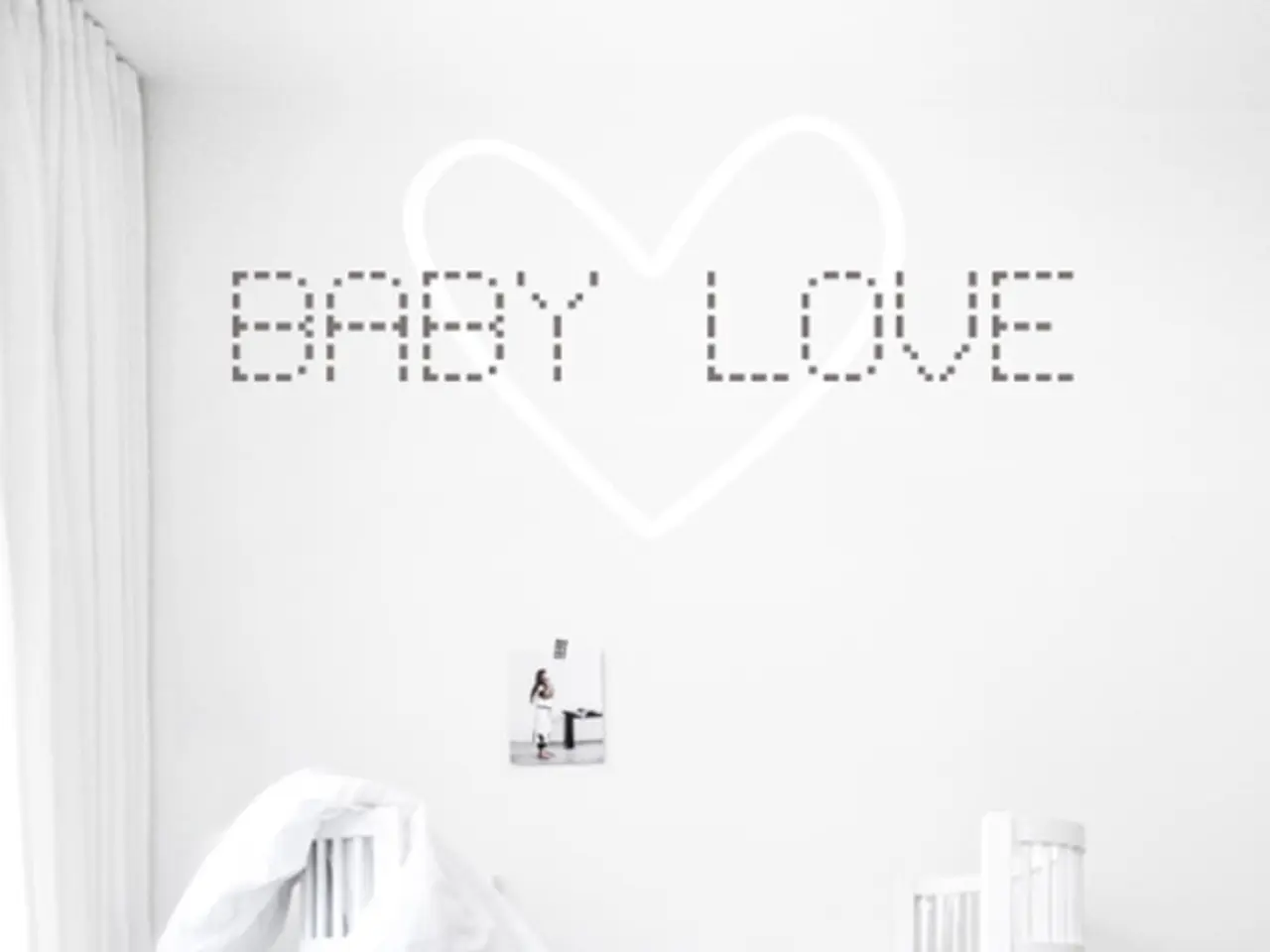 At the bottom of the picture, we see a carpet in grey color and we see a pillow in grey color. In...