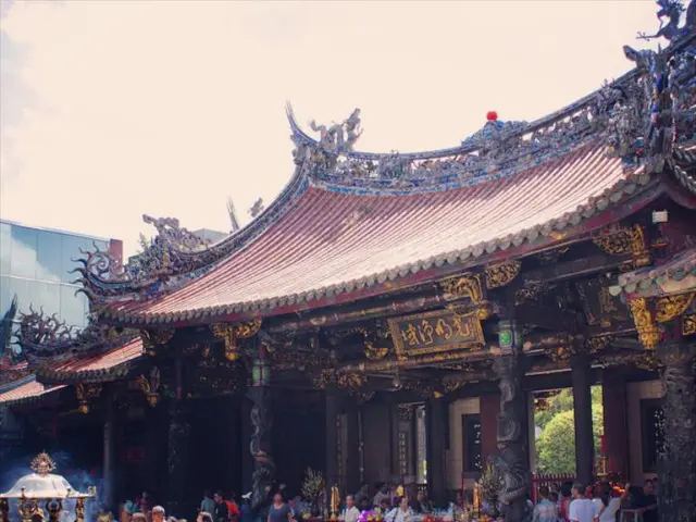 Returned from Japan, roof tiles adorned with dragon motifs and intricate eaves provide a peek into...