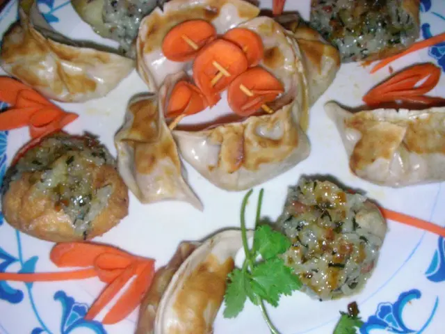 Sea joy in Neustadt as fish rolls and pizza enjoyed by hands on the seashore