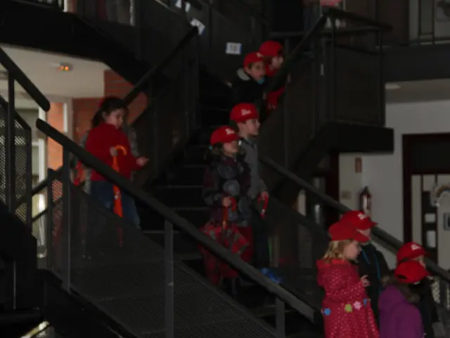 Youngsters escorting youngsters in the debut of the local municipal building